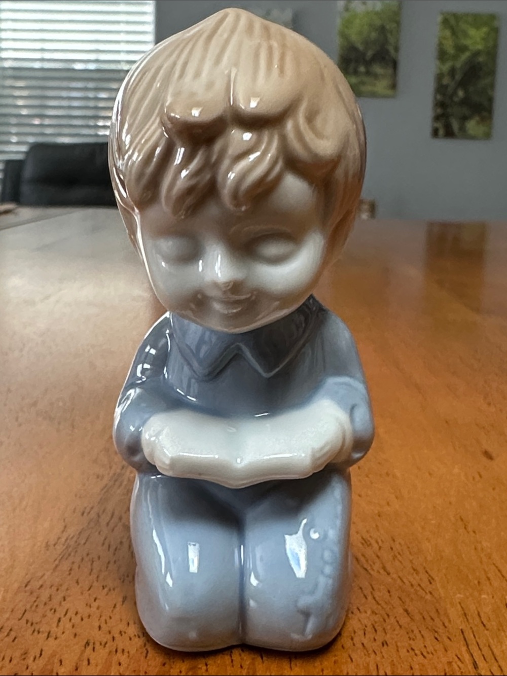 Korean porcelain prayer boy .